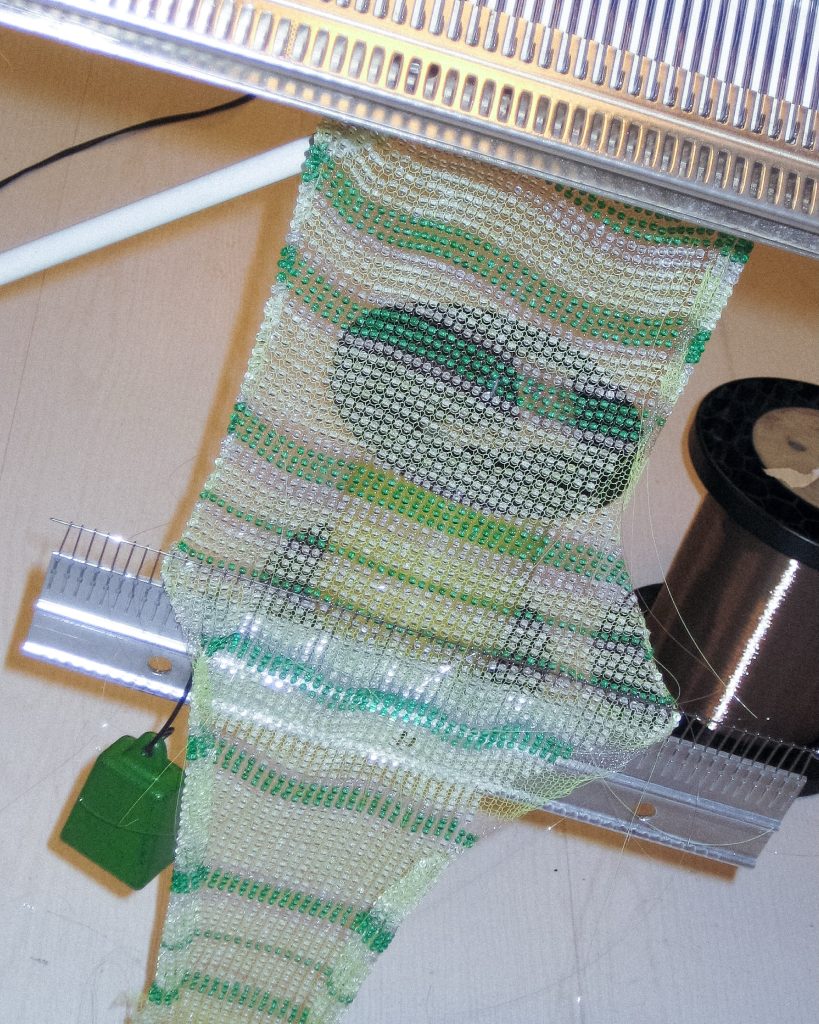 The play of light through multiple layers of woven glass beads, highlighting the shifting optical effects created by the transparent construction