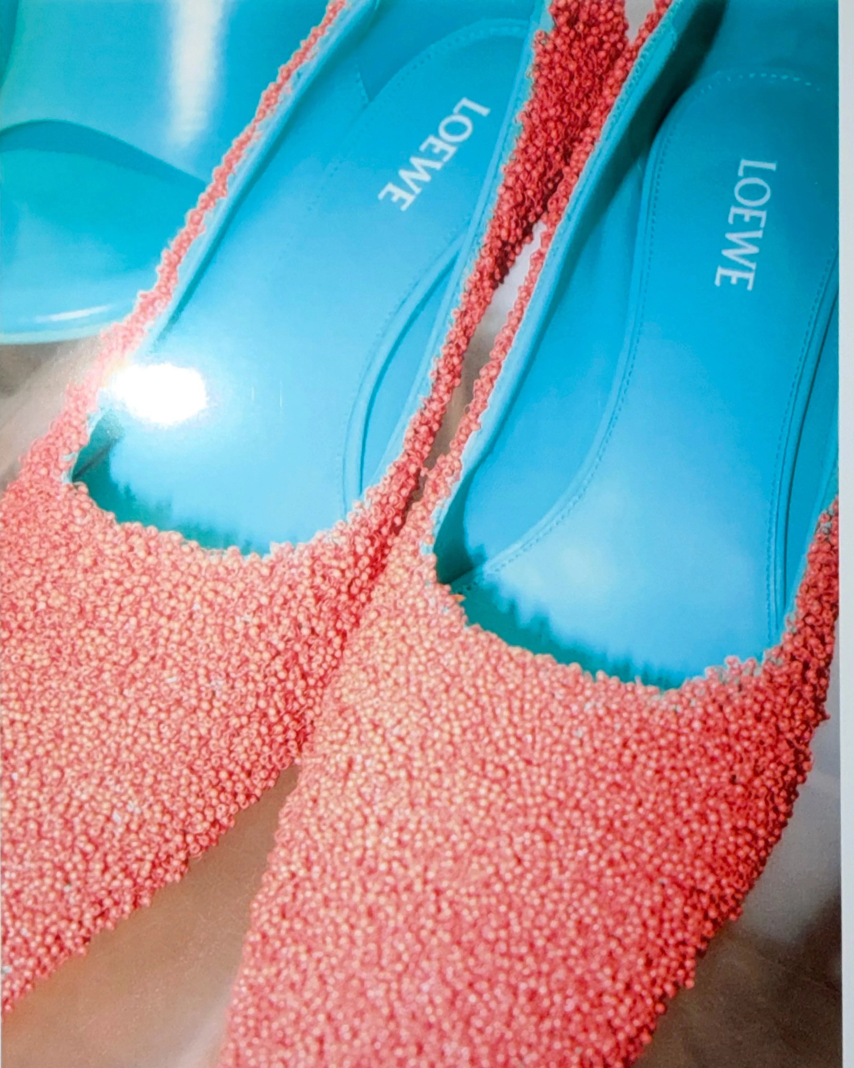 Detail of beaded floral motif showcasing the sophisticated craftsmanship throughout the collection