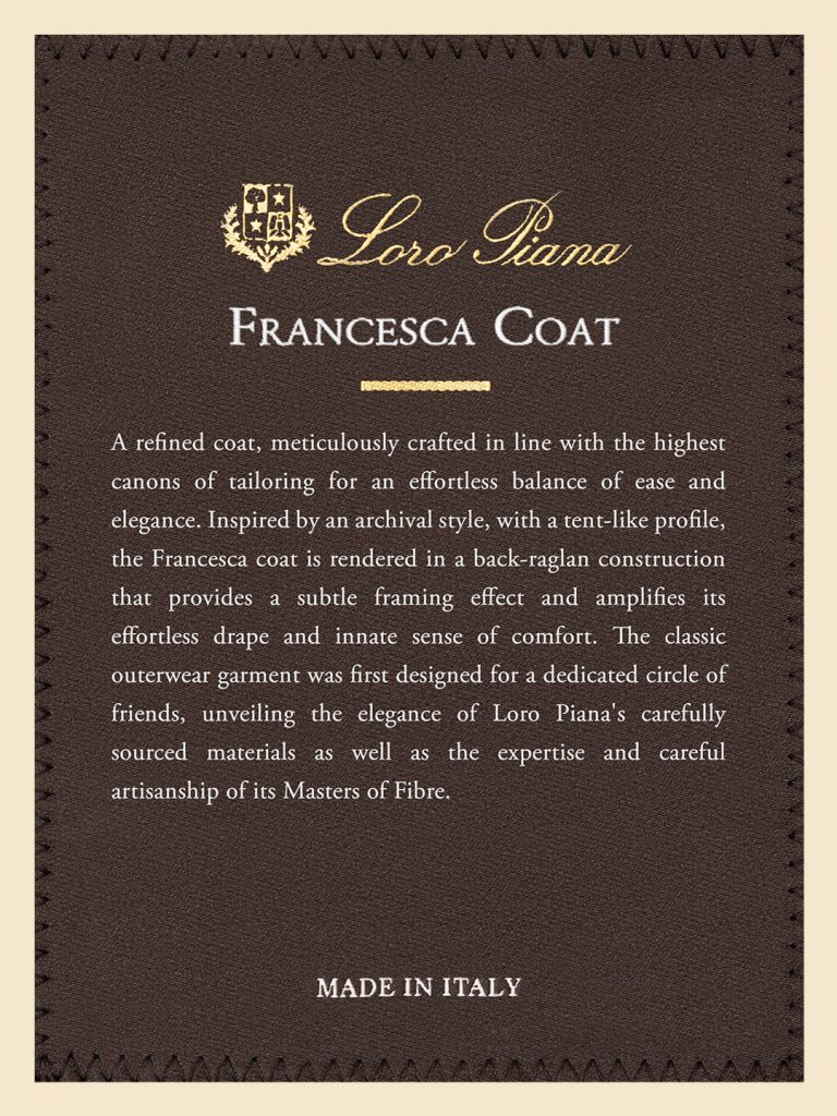 Detail shot of the Francesca coat's refined construction and fabric texture within Ellen Dahl's contemplative literary space