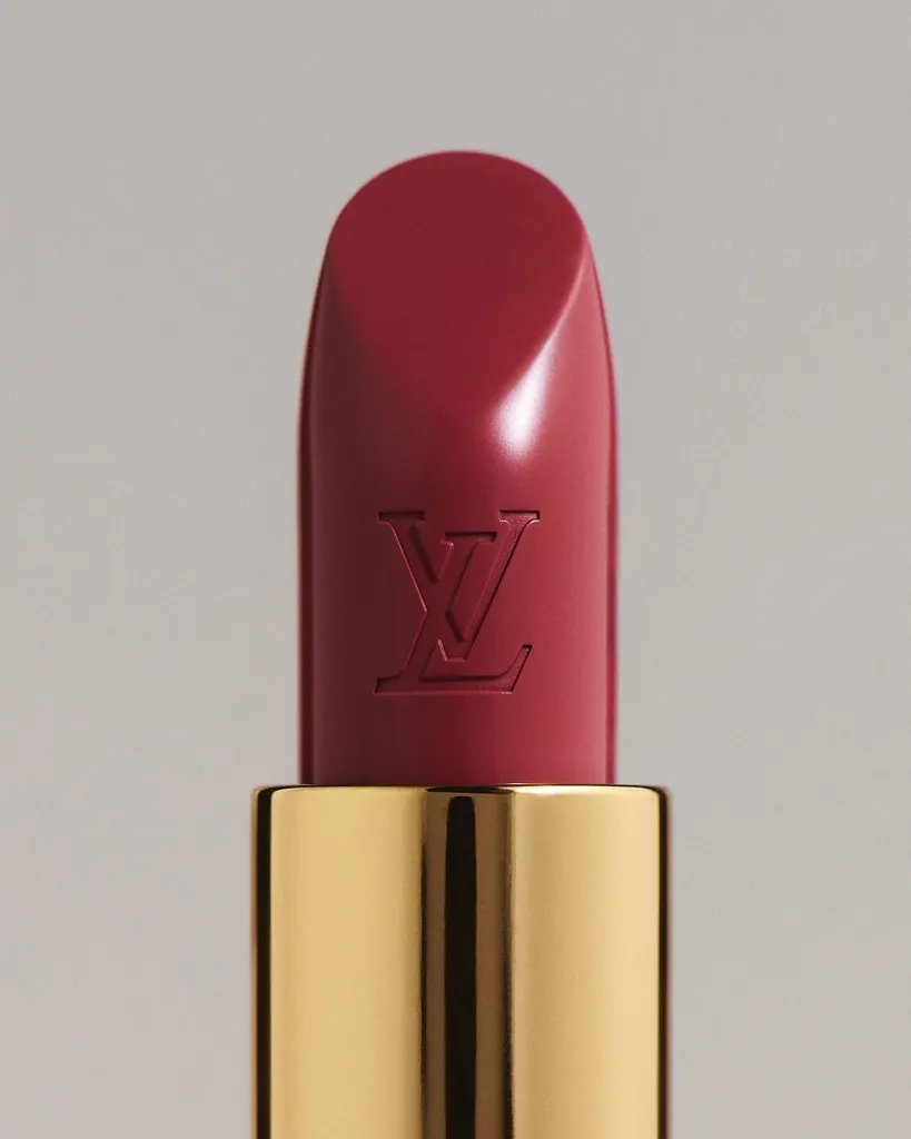 Full look from Louis Vuitton Spring-Summer 2027 show with fresh, radiant beauty aesthetic and bold accessories