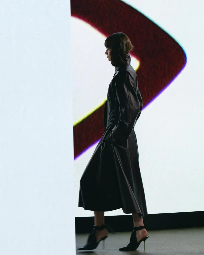 Detail of tailored craftsmanship highlighting Alaïa's precise cutting techniques