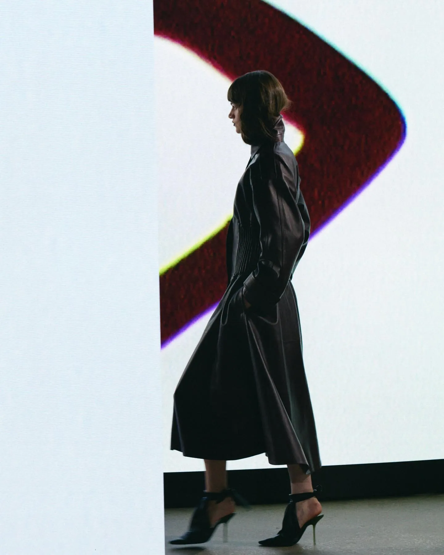 Detail of tailored craftsmanship highlighting Alaïa's precise cutting techniques