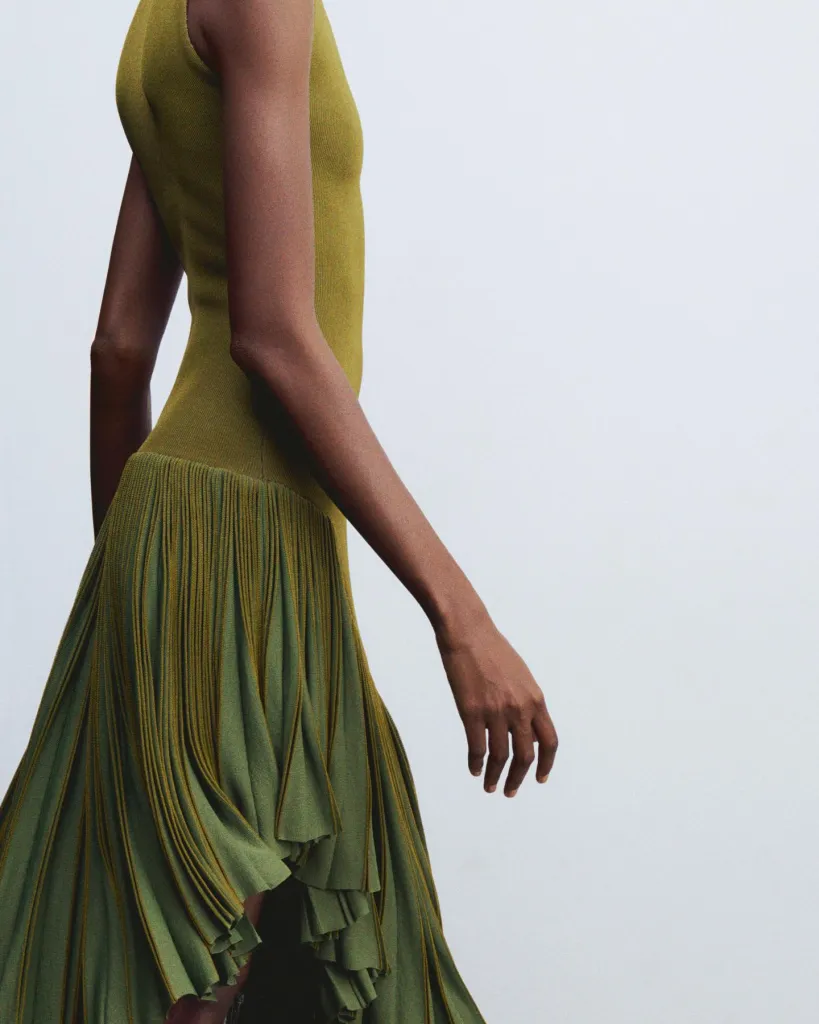 Sculptural form exemplifying the brand's signature approach to refined femininity