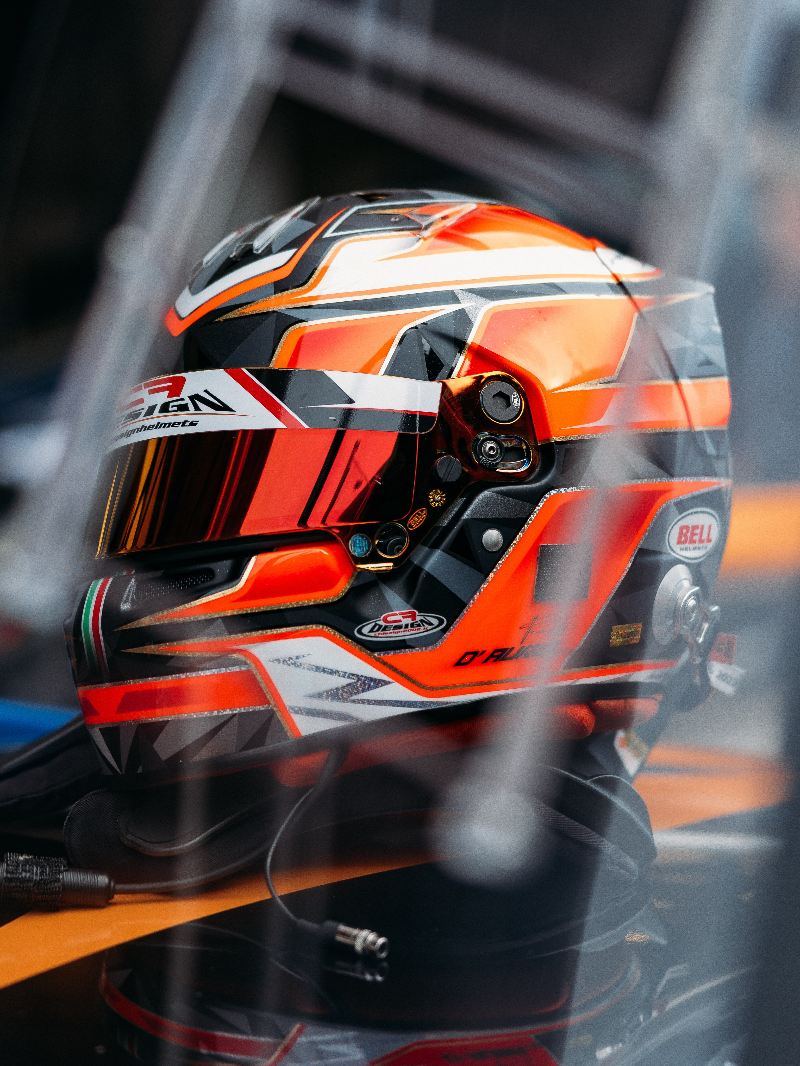 Customer racing McLaren vehicles lined up on circuit