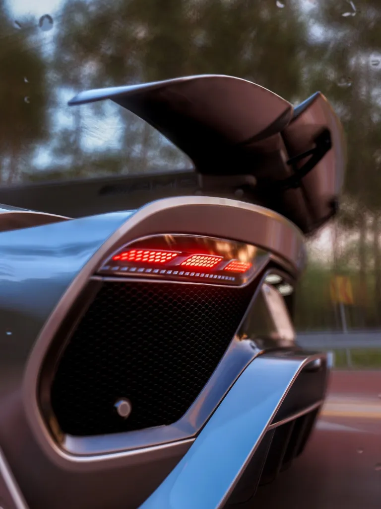 Sleek side profile of the Mercedes-AMG ONE revealing its sculptural design and purposeful proportions