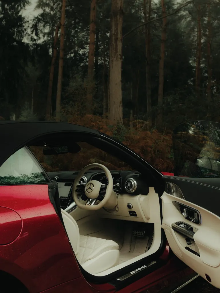Mercedes-AMG SL 55 4MATIC+ in dynamic driving motion on country road