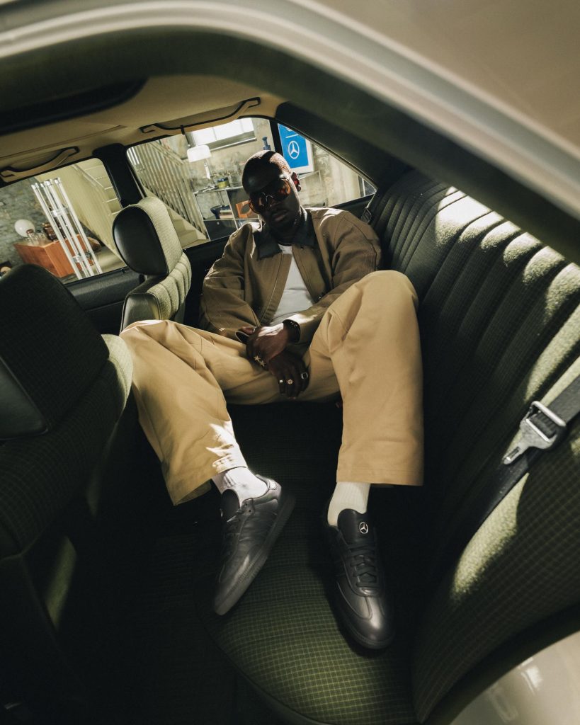 The collaborative shoe in lifestyle setting suggesting understated luxury
