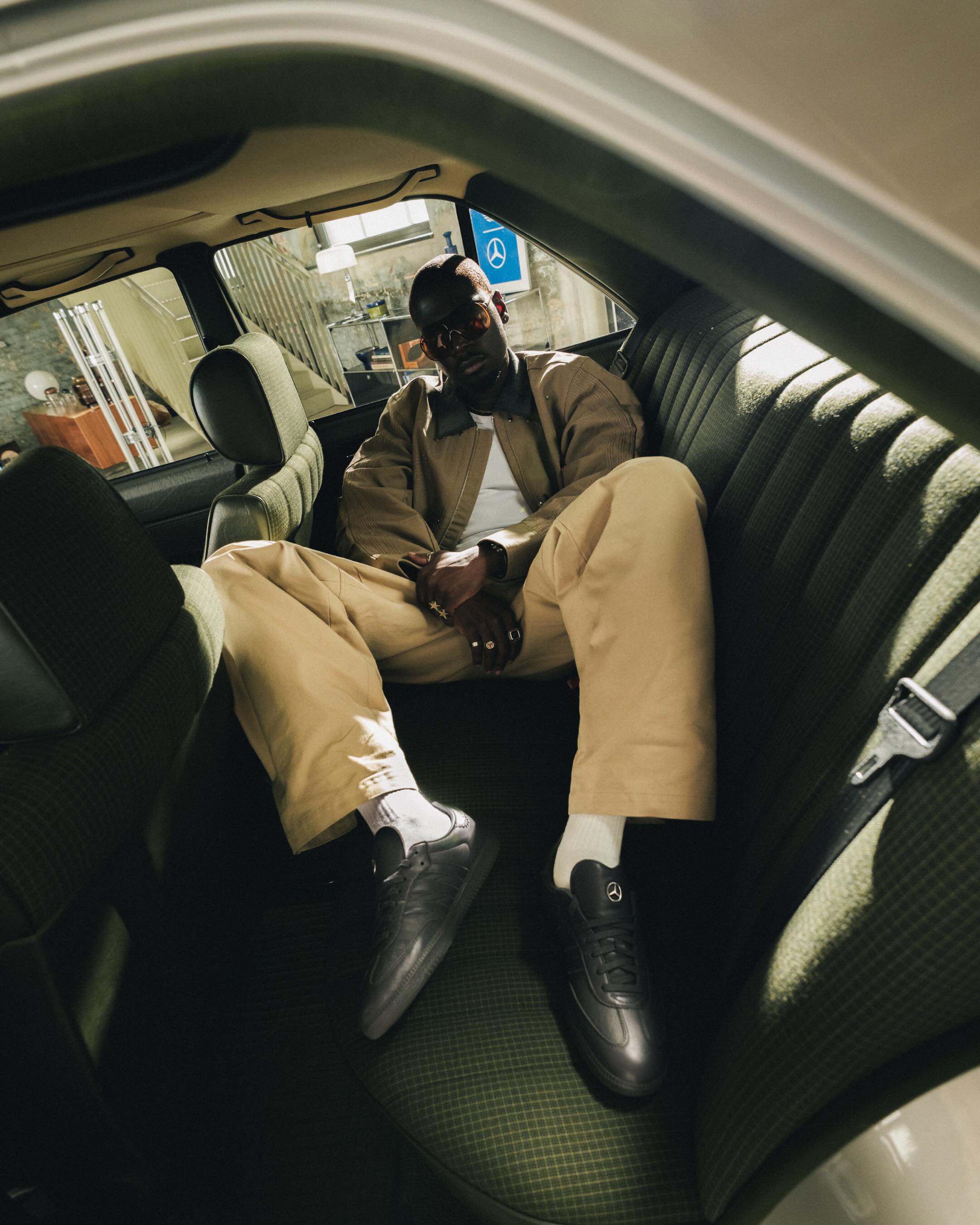 The collaborative shoe in lifestyle setting suggesting understated luxury