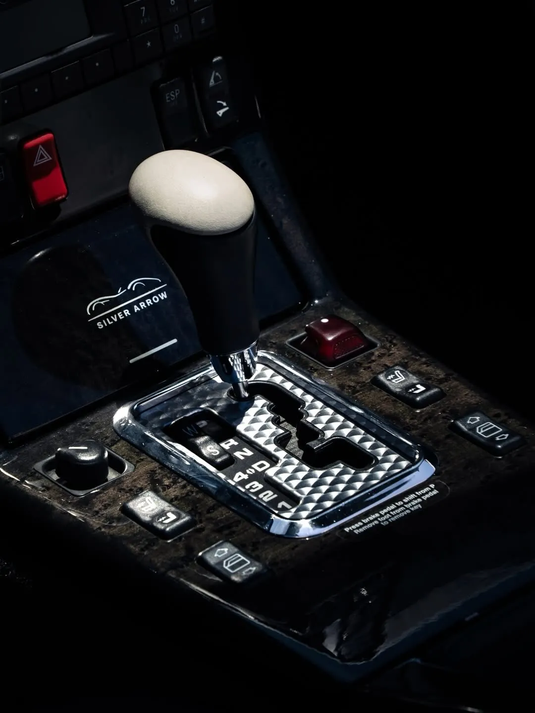 Detail view of the elegant Mercedes-Benz SL 500 convertible roof mechanism and body lines