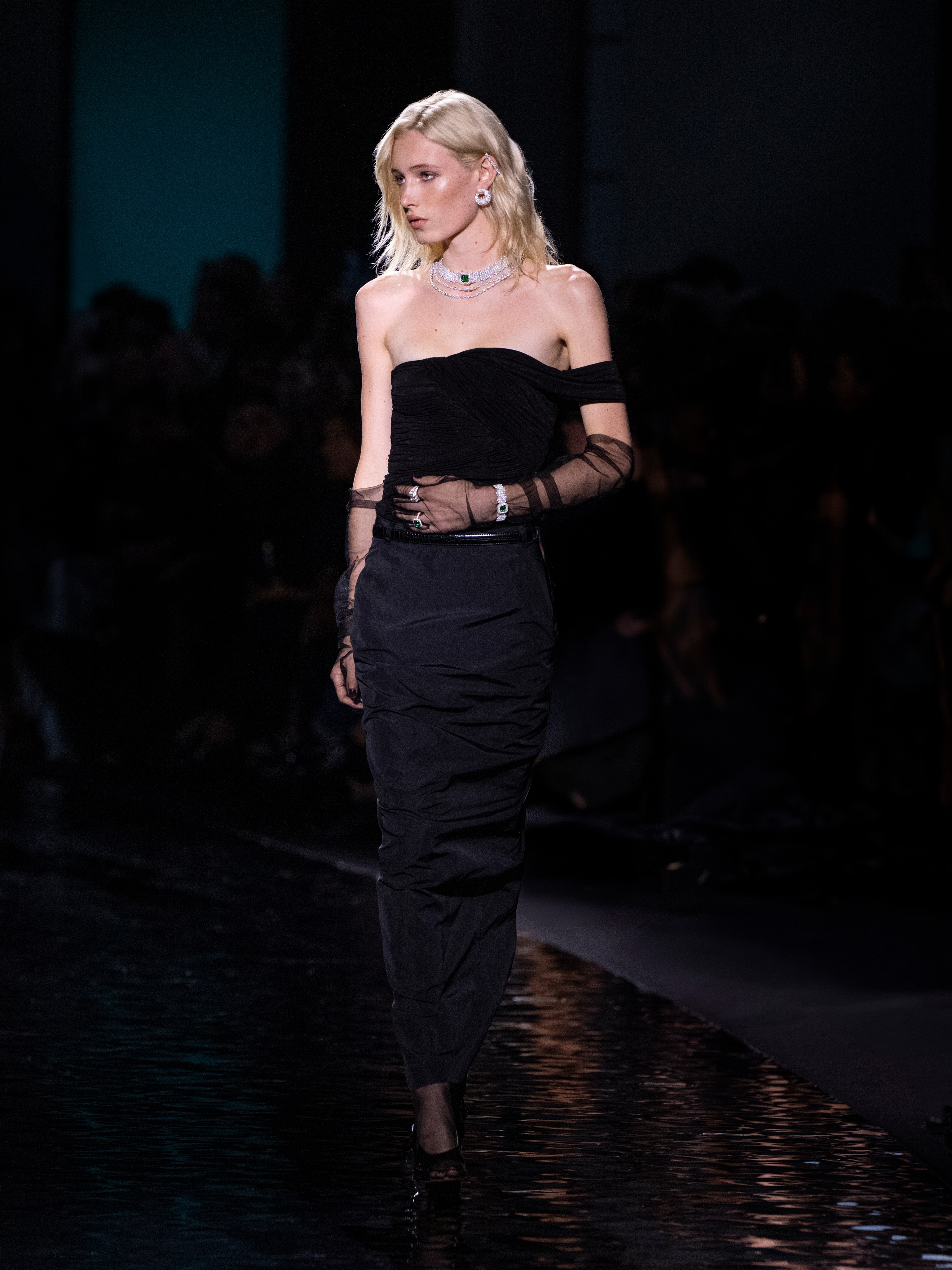 Model wearing striking Messika High Jewelry statement ring with contrasting precious stones