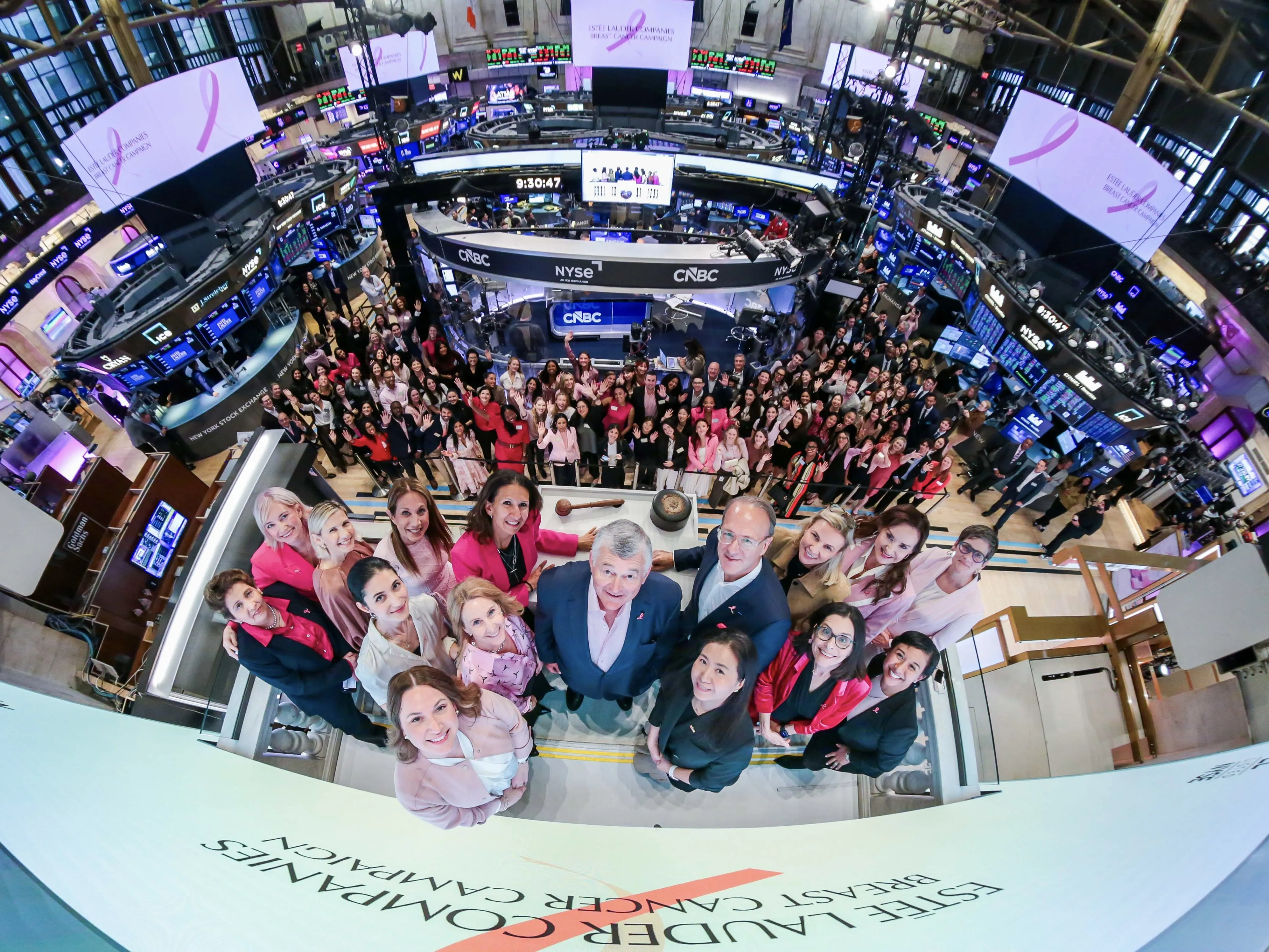 Pink ribbon symbol representing global breast cancer awareness and research dedication