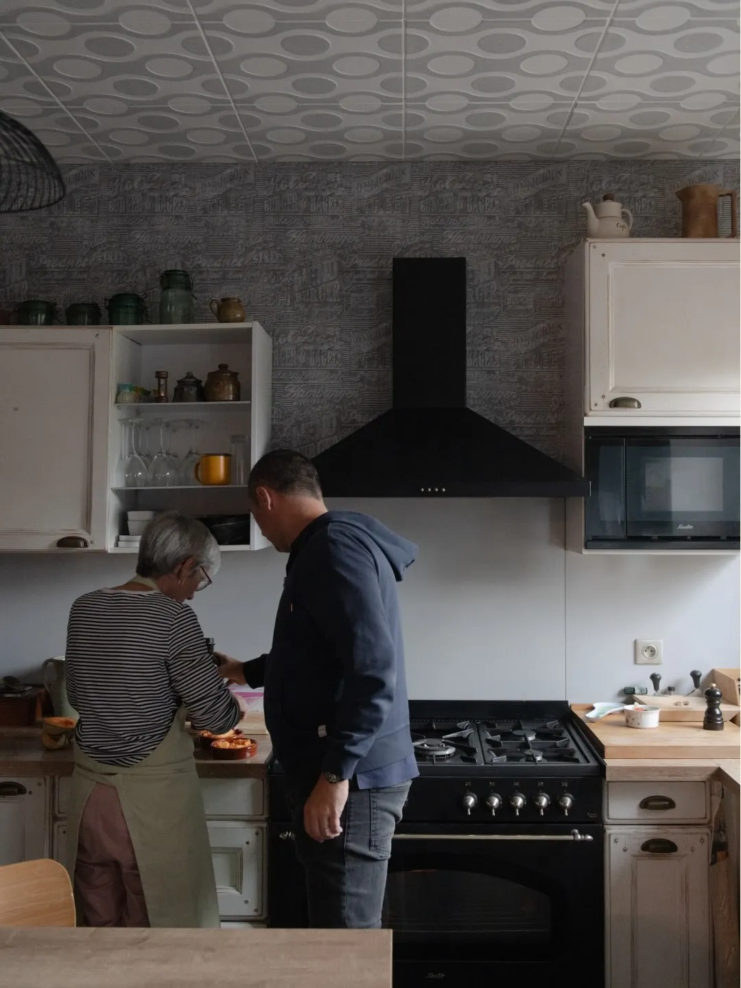 Interior pages of Odette French cookbook showcasing culinary narratives and photography