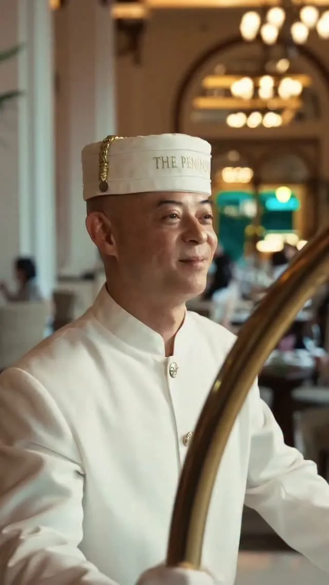 The Peninsula Hong Kong's elegant facade overlooking Victoria Harbour, exemplifying timeless architectural luxury and harbour-side prestige