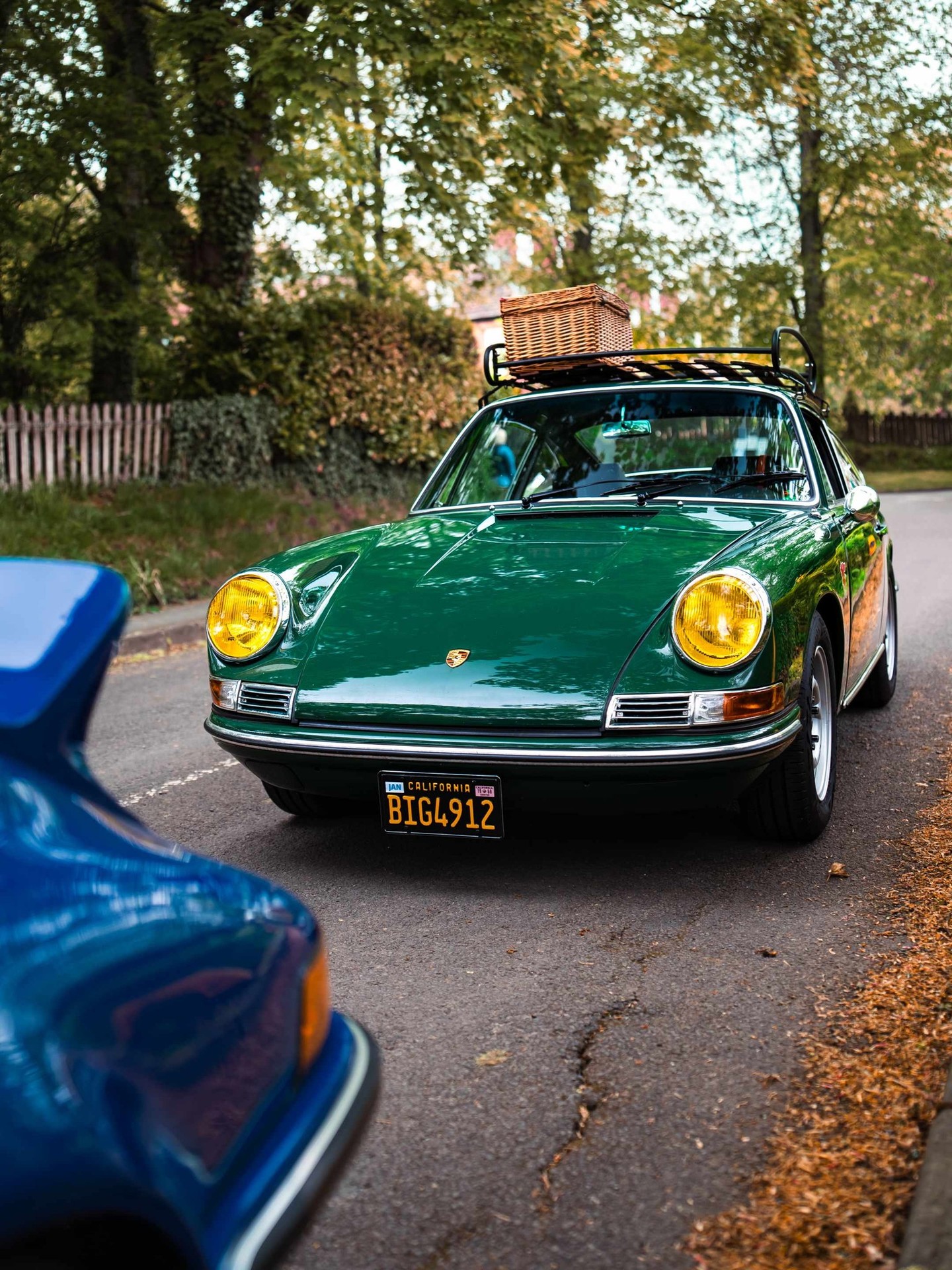A stunning Porsche model gleaming under natural light, showcasing its iconic silhouette and refined proportions