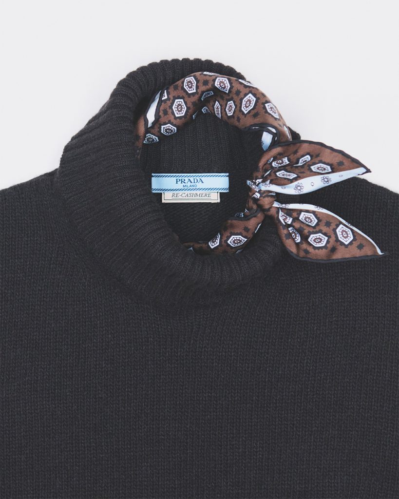 A complete autumn-winter 2026 ensemble in Re-Cashmere and Re-Wool, demonstrating the refined aesthetic and enduring luxury of Prada's responsibly sourced collection