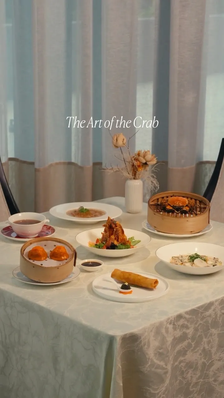 An elegantly plated crab dish prepared in the refined Cantonese style at Royal China, Raffles Sentosa