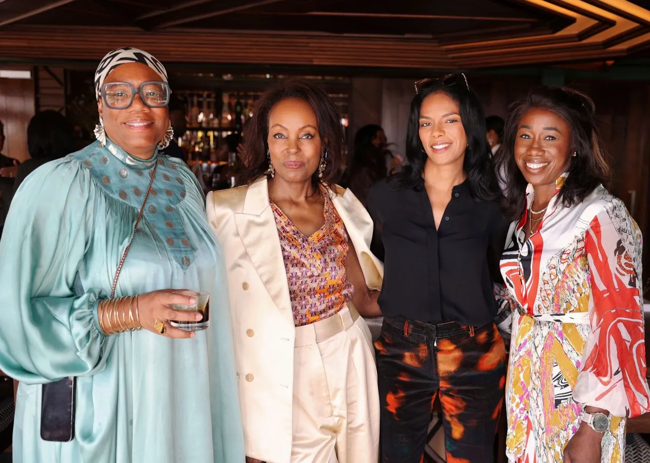 Group portrait of exceptional black female founders and Rathbones colleagues at an intimate luncheon gathering