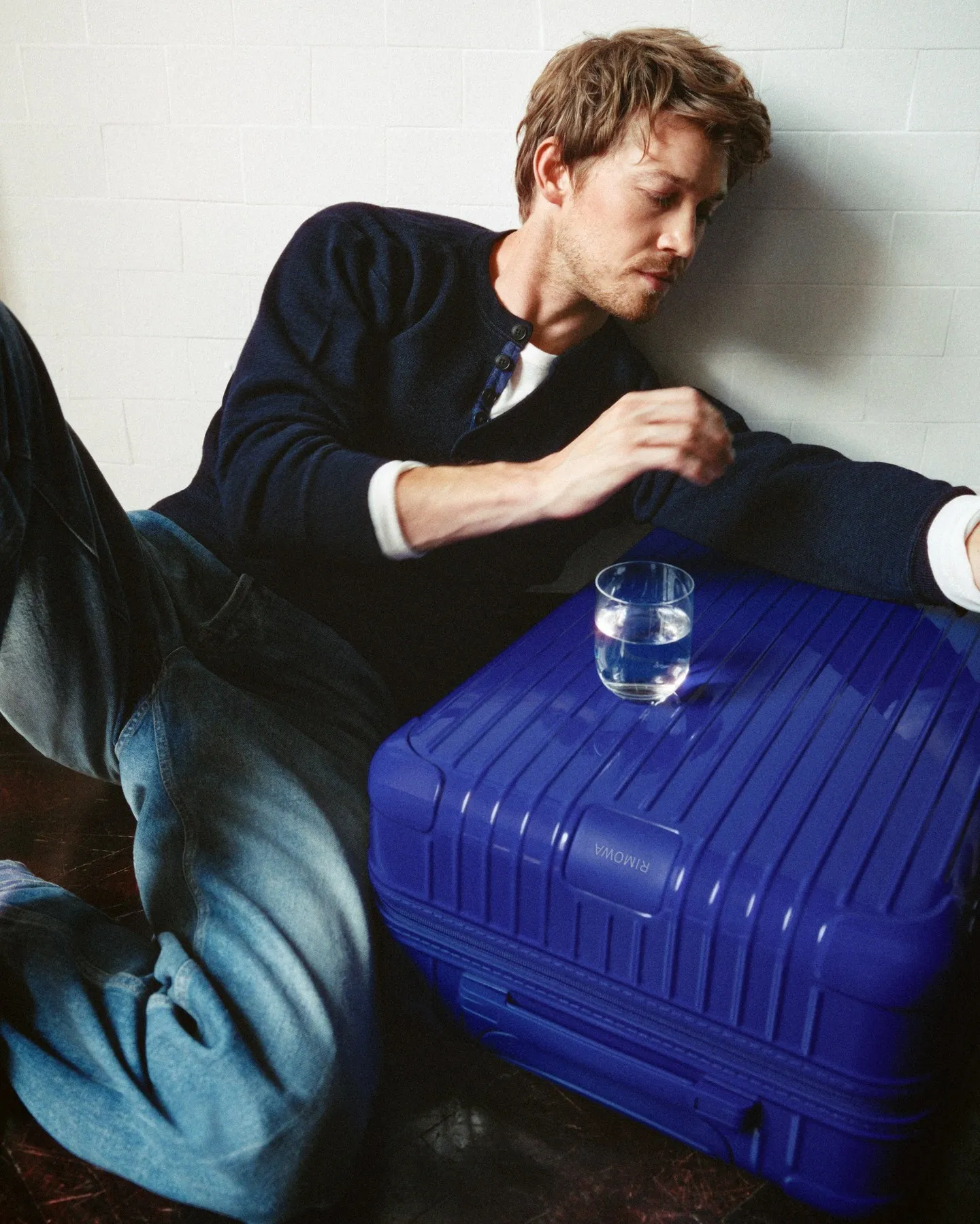 Rimowa Ultramarine limited edition suitcase, showcasing deep oceanic blue colourway with signature grooved exterior