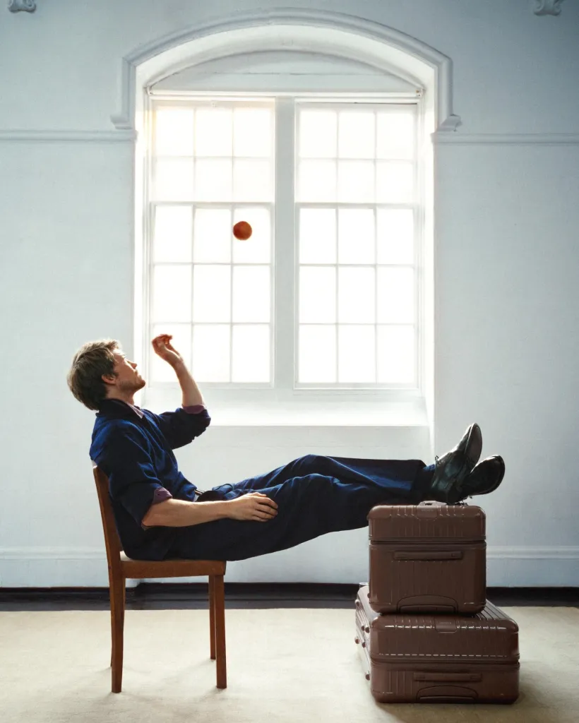 Rimowa Essential collection luggage in both Ultramarine and Umber colourways, ready for sophisticated autumn travel