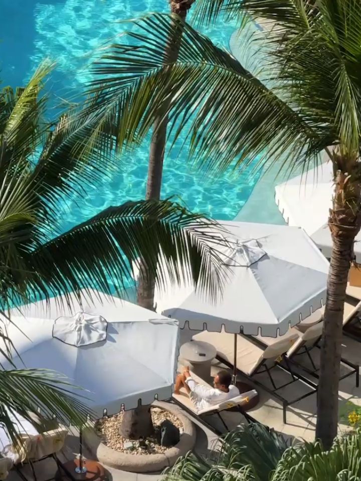 Elegantly appointed suite interior with ocean views and contemporary luxury furnishings