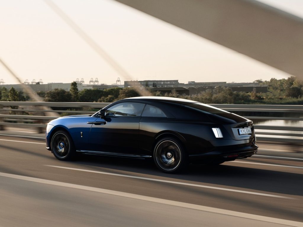 Side profile of the Spectre Series II demonstrating the mesmerising motion blur effect across the coachwork