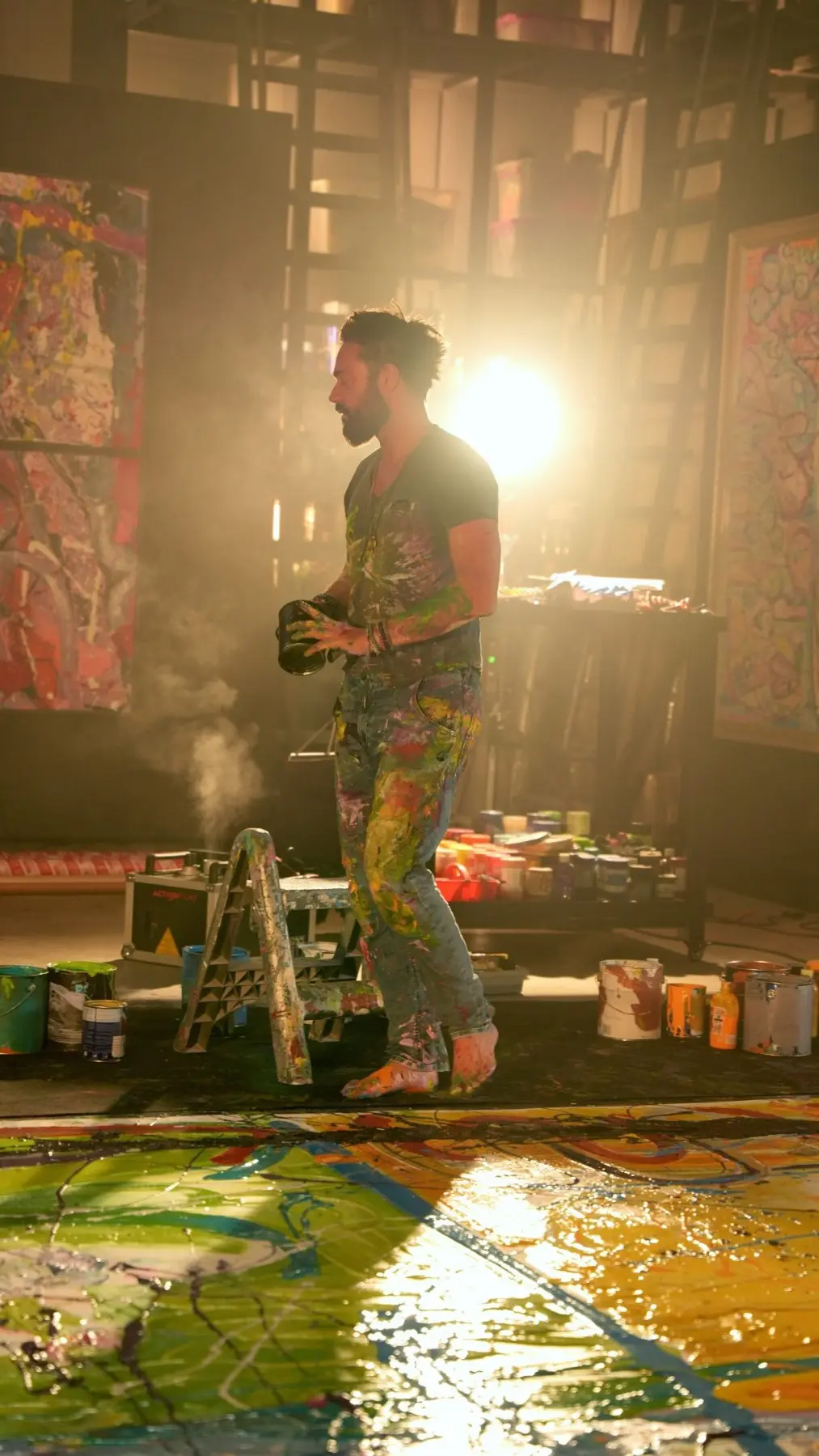 Sacha Jafri painting in his studio