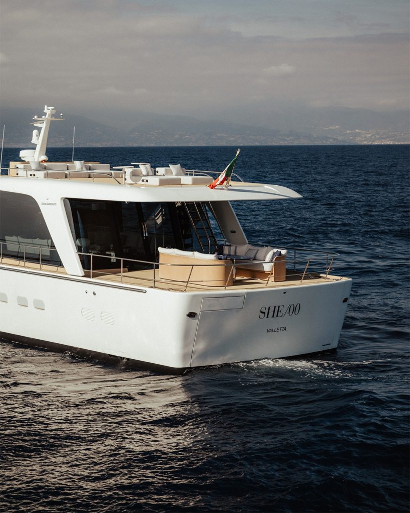 Sanlorenzo vessel docked in historic Genoa, embodying luxury seaside living