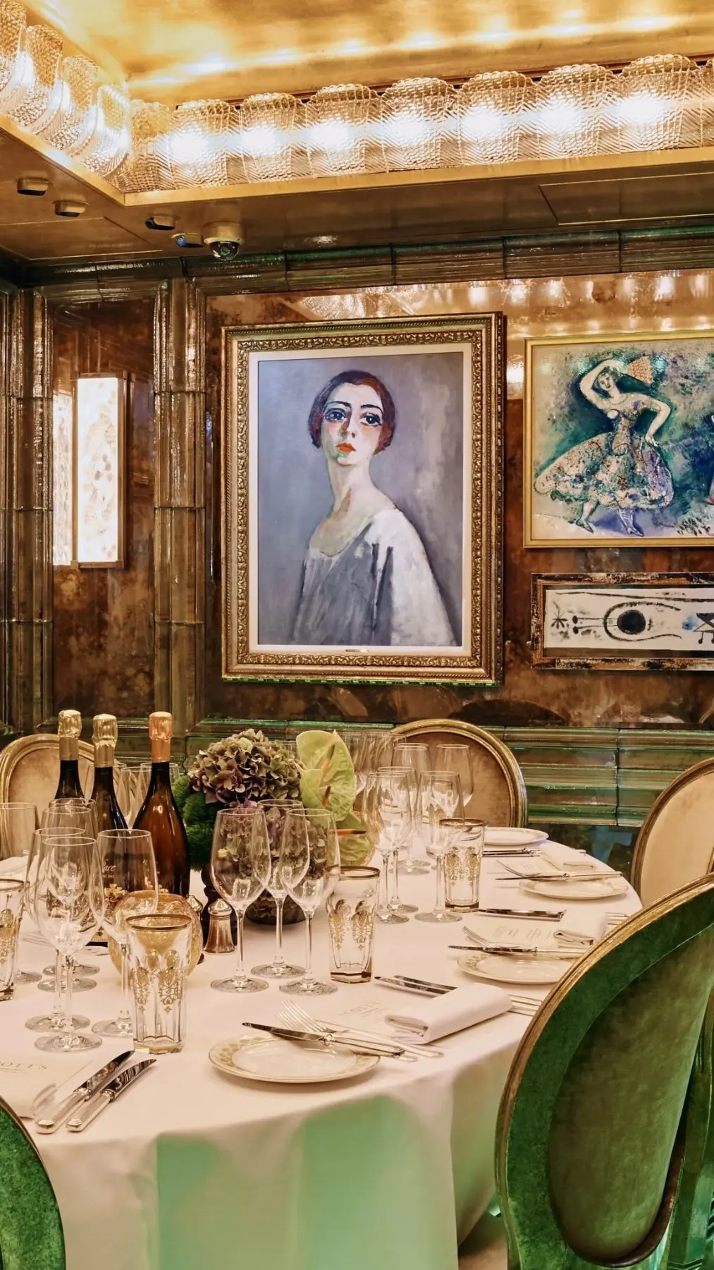 The dining room at Scott's, hung with art