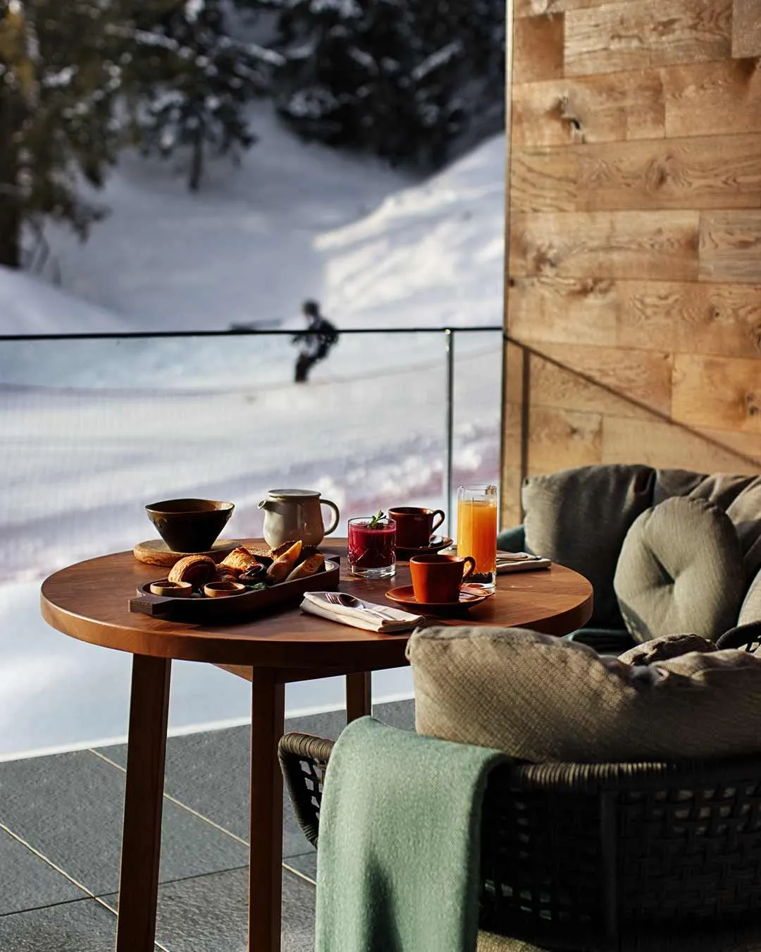 Luxurious mountain resort interiors with alpine views, showcasing contemporary Alpine architecture and refined hospitality spaces