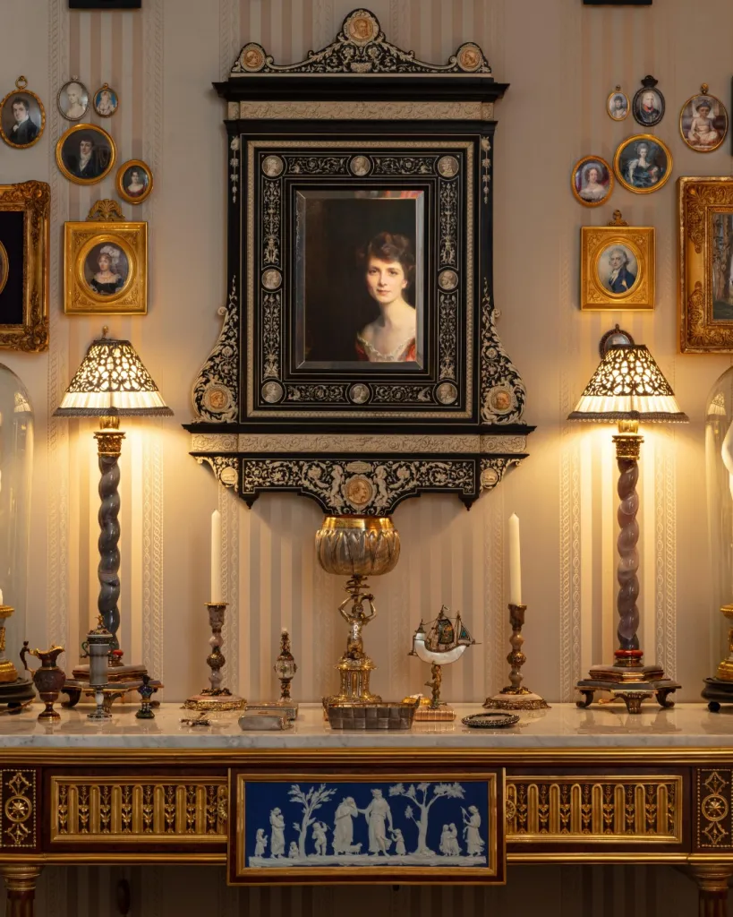 Kunstkammer salon featuring curated collection of antique sculptures and objets d'art