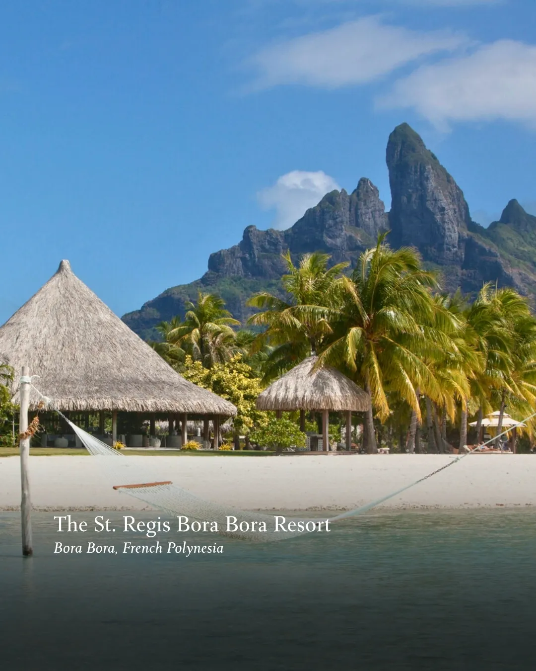 Overwater bungalows at St. Regis Bora Bora with turquoise lagoon waters beneath
