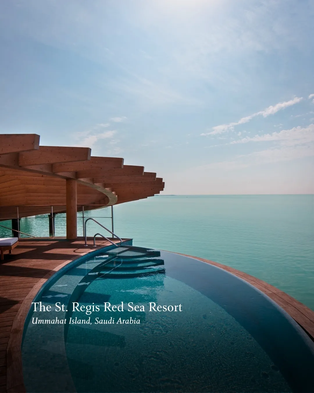 Sunset view from St. Regis Red Sea property with golden light reflecting on water