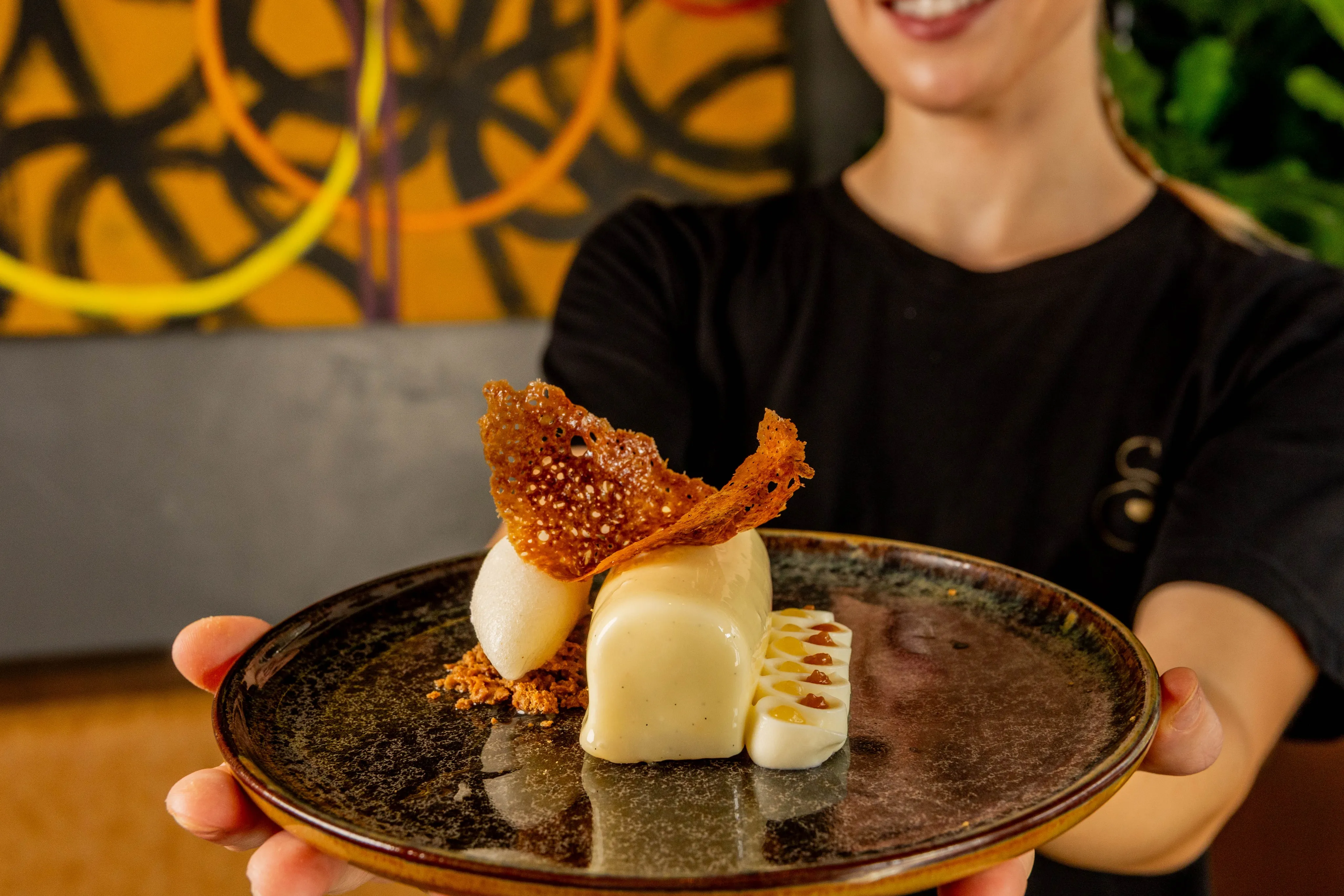 Close detail of the yuzu pear gel and Ford's Farm bayrum and ginger sorbet on the finished dessert