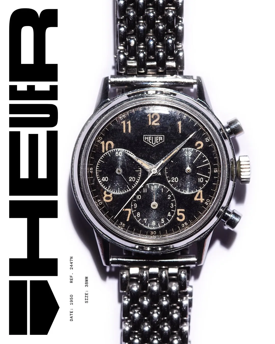 1950 Heuer reference 2447 chronograph displaying characteristic black dial and enlarged case construction