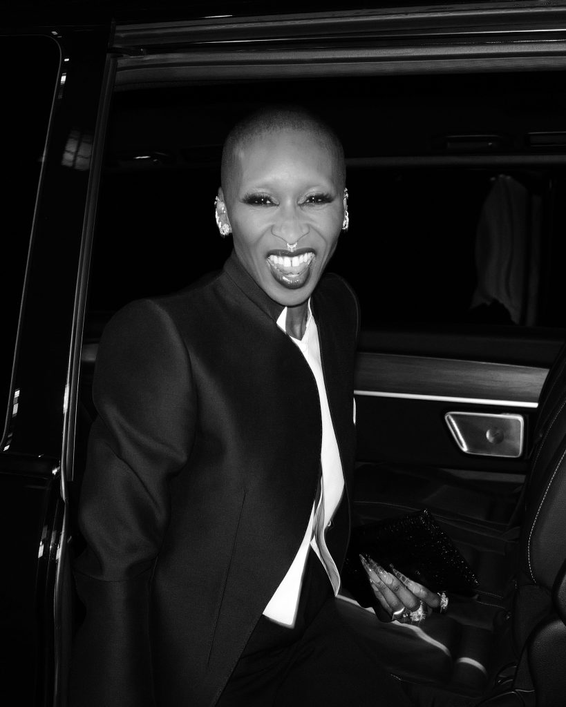 Well-dressed guest at the designer's Parisian gathering