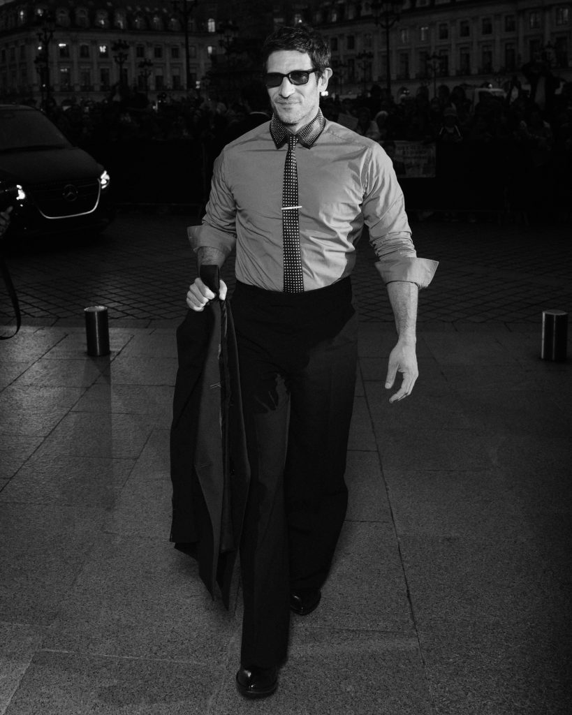 Fashionable figure in tailored clothing at défilé