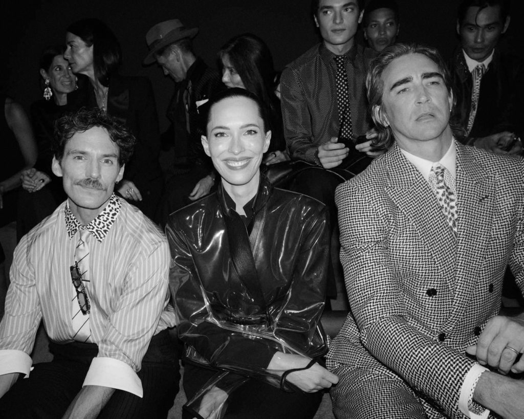 Elegantly dressed attendee at the Paris Tom Ford défilé event