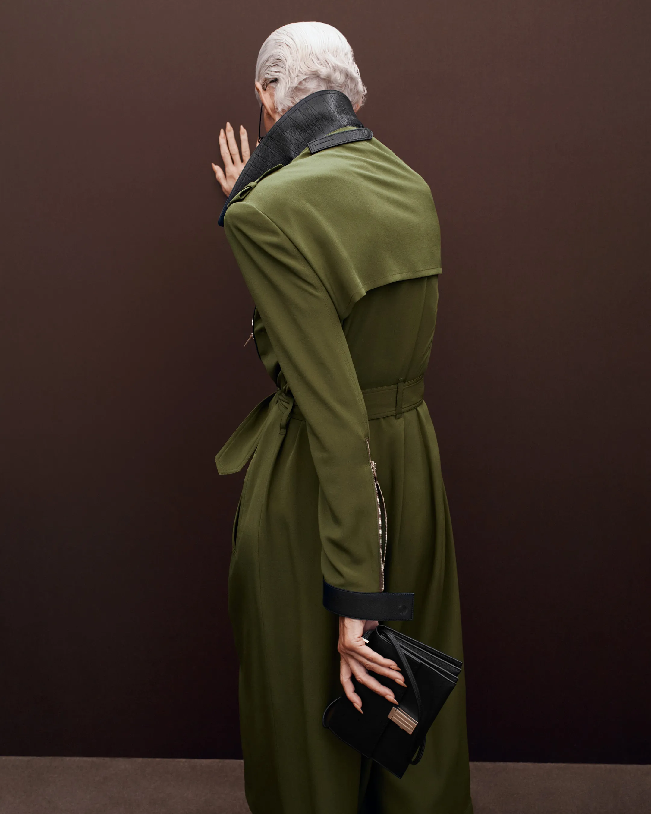 Model in polished accessories and minimal jewellery, exemplifying Tom Ford elegance