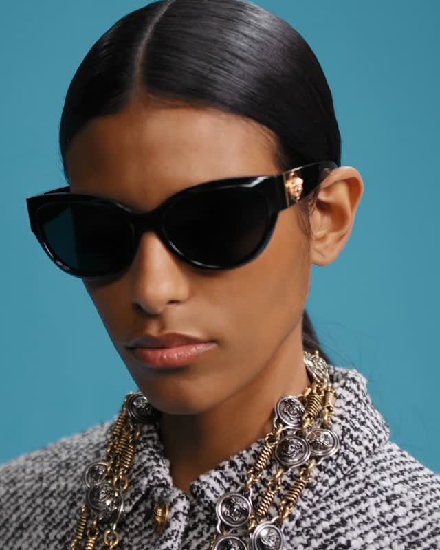 Model wearing Versace AW26 optical frames, showcasing style and wearability