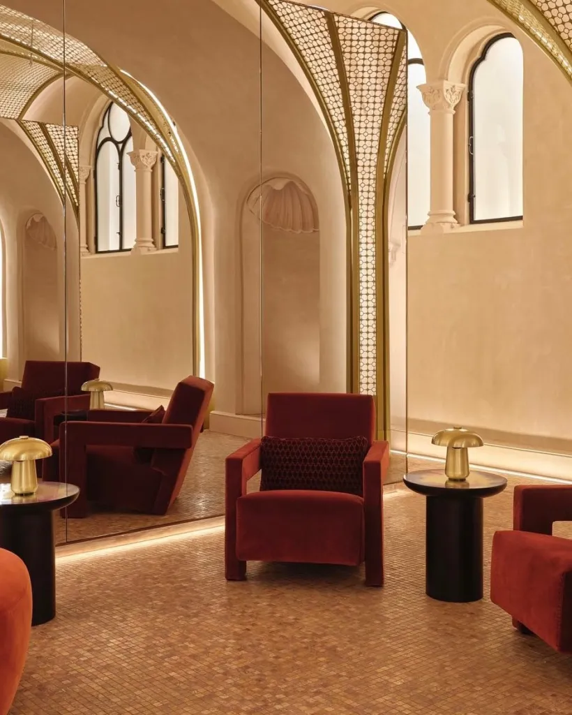 W Hotels' seasonal design featuring statement piece seating against richly textured wall treatments