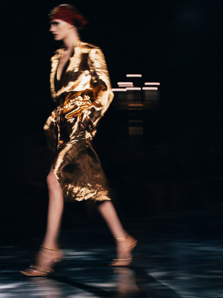 Close up of luxurious fabric texture and precision tailoring on a Saint Laurent summer garment