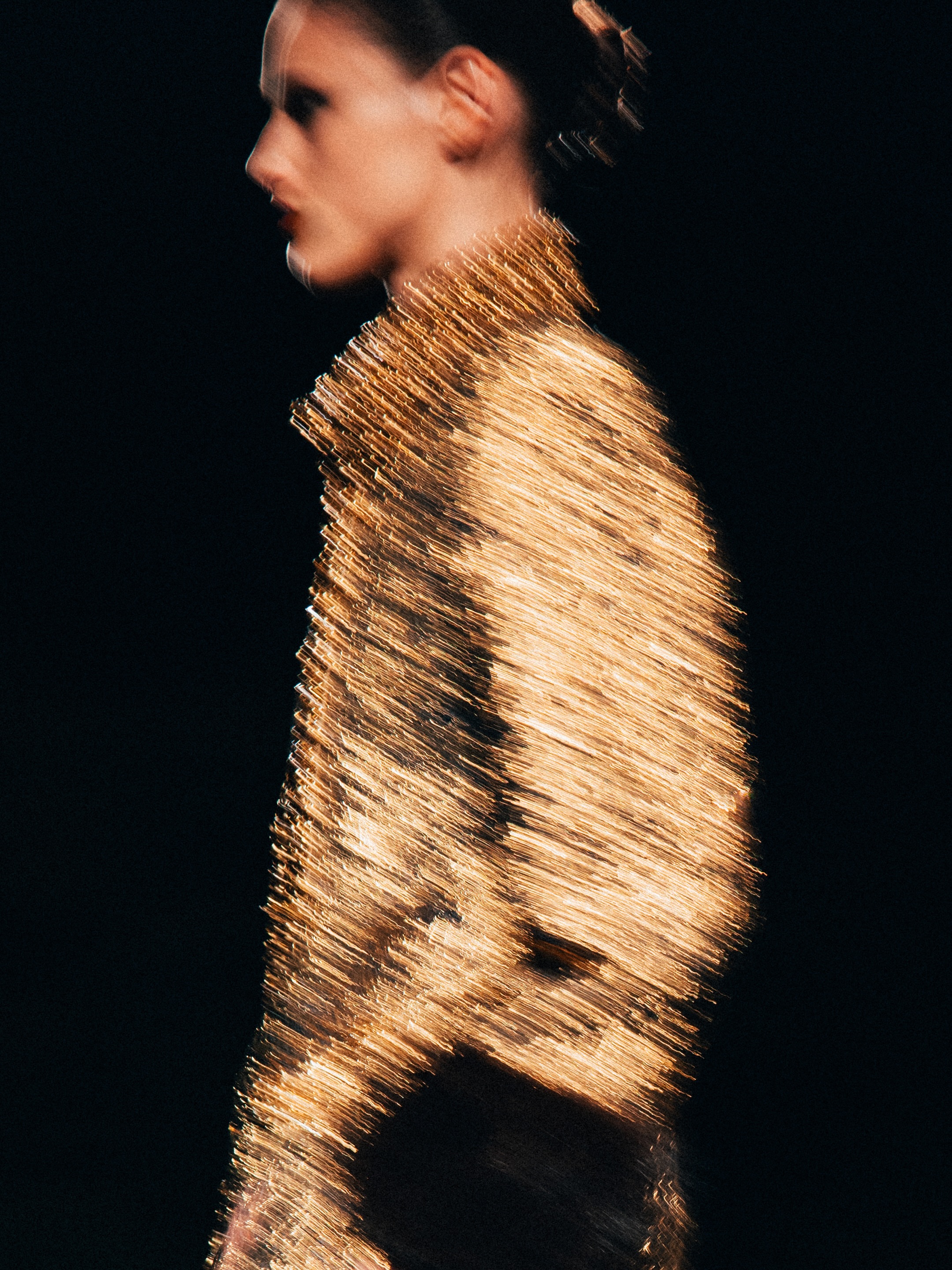 Model wearing a deconstructed Saint Laurent blazer from the Women's Summer 27 range