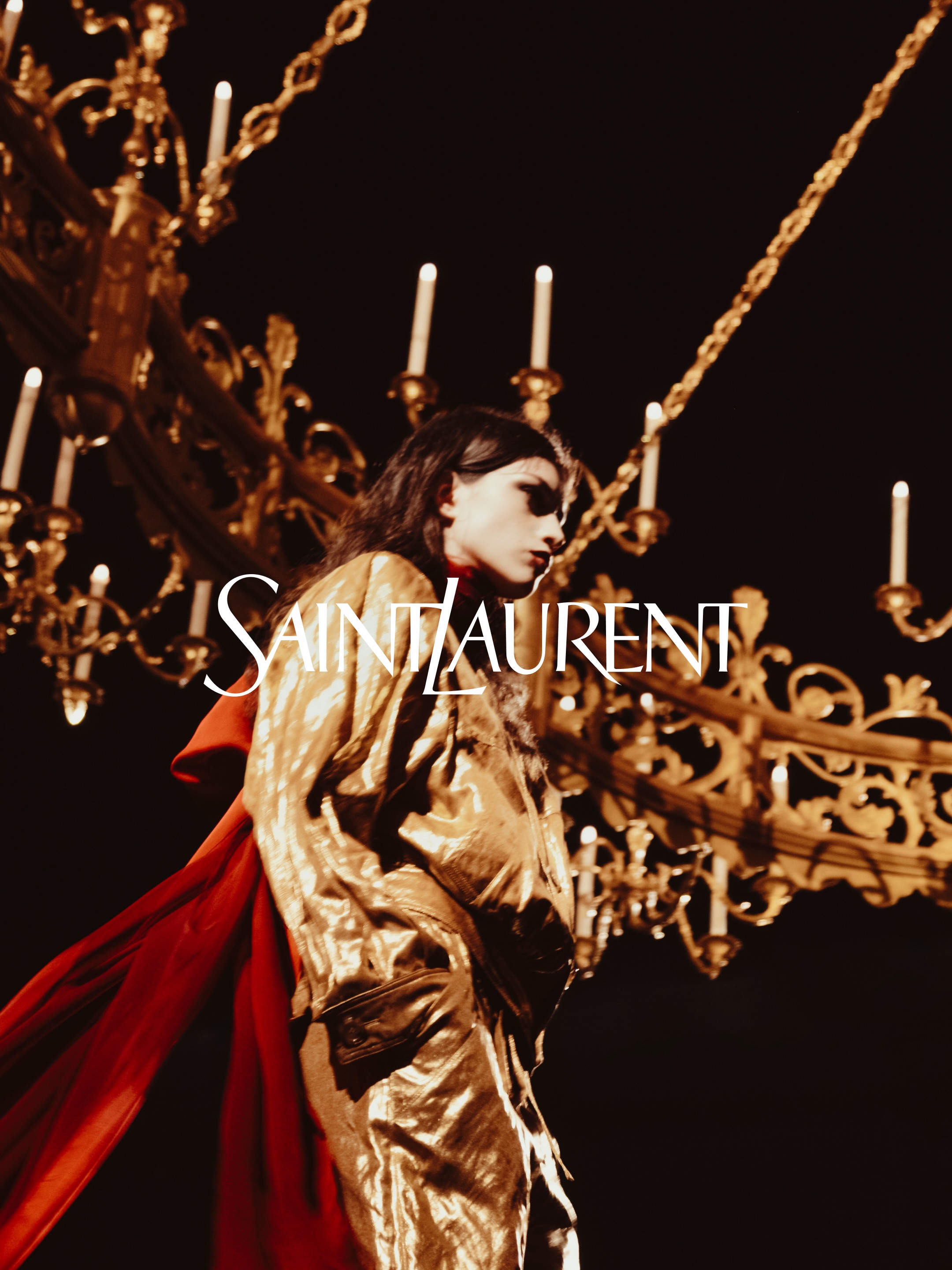 Flowing cream silk gown with elongated silhouette from Saint Laurent's Summer twenty twenty-seven collection