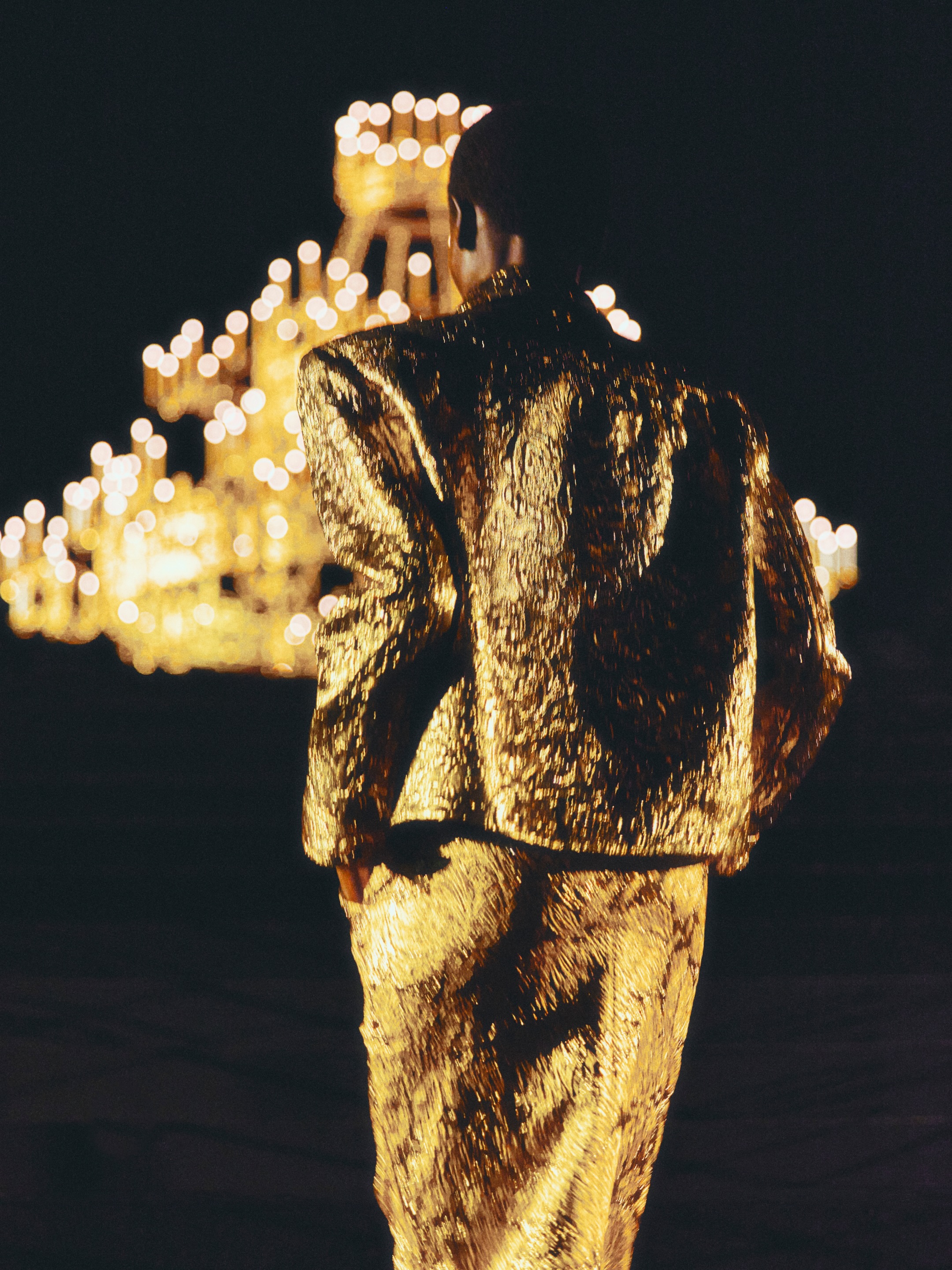 Final silhouette embodying Saint Laurent's timeless approach to modern feminine elegance