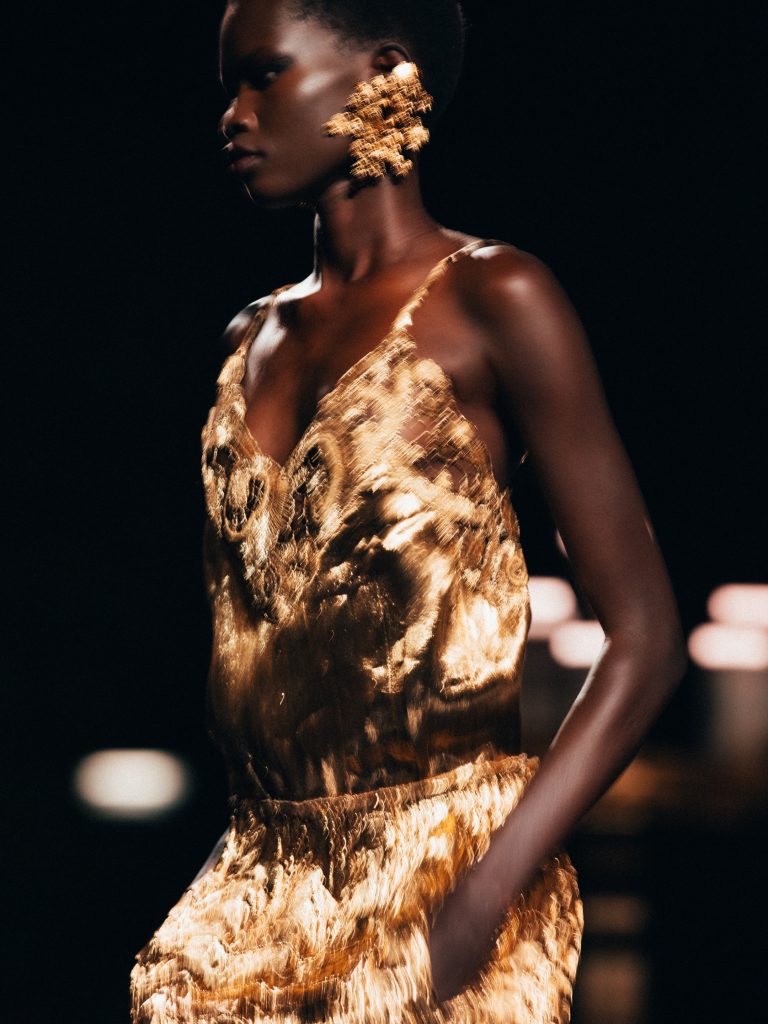 Neutral-toned ensemble showcasing tonal layering and refined textile combinations