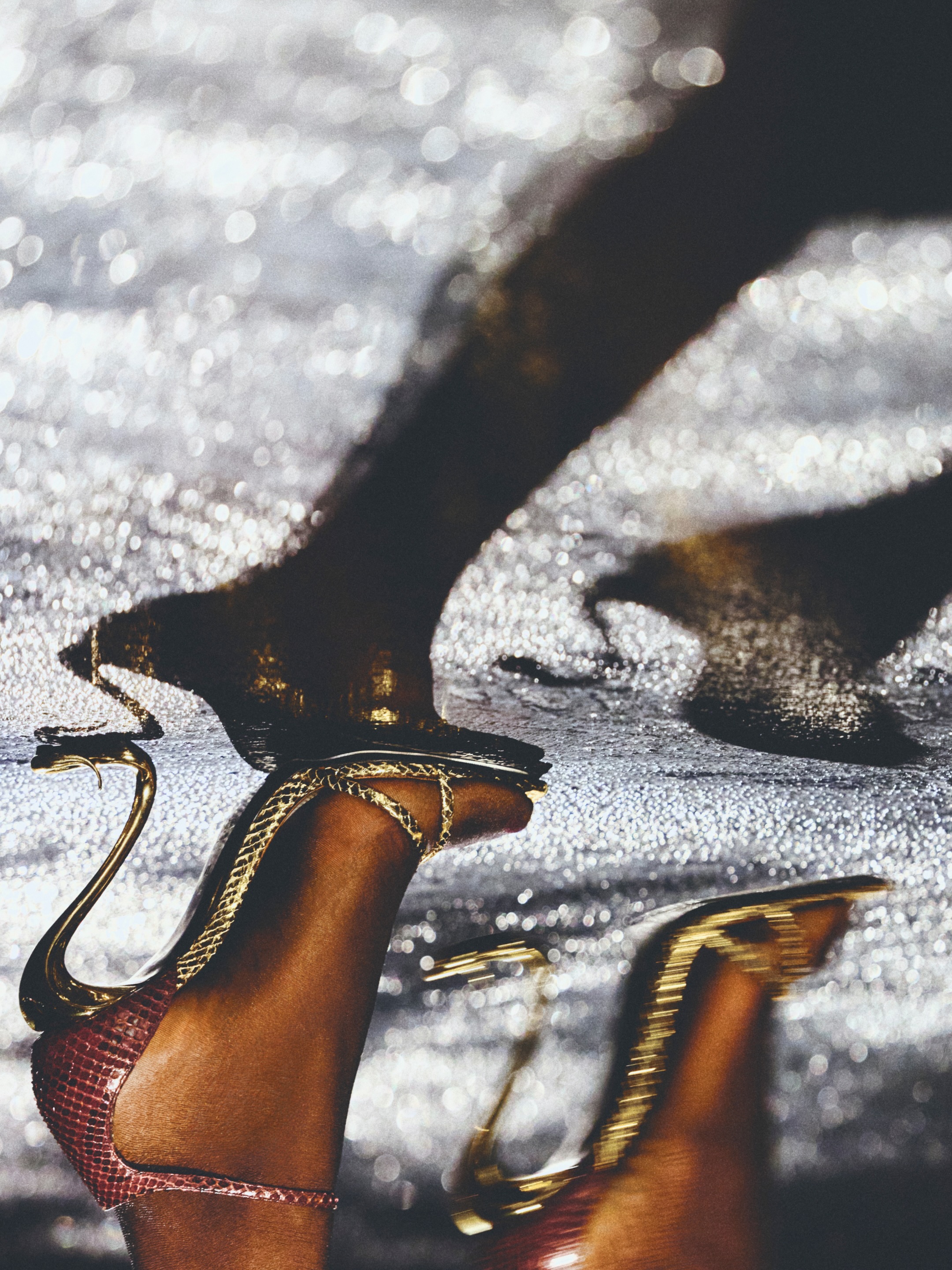 Model in elongated silhouette emphasising the collection's balletic proportions