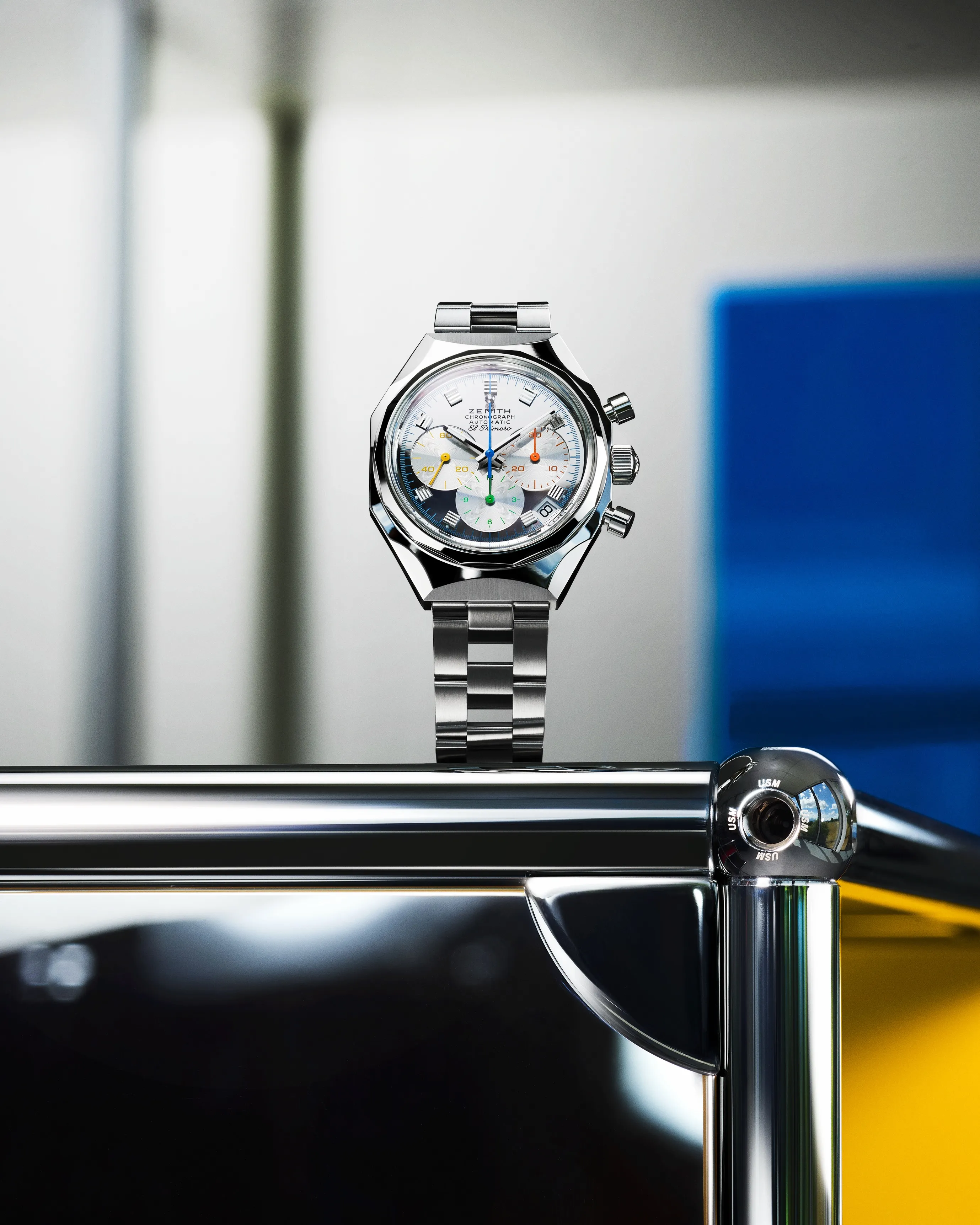 Zenith DEFY Chronograph USM with mirror-polished dial displaying Golden Yellow, Pure Orange, Green and Gentian Blue details