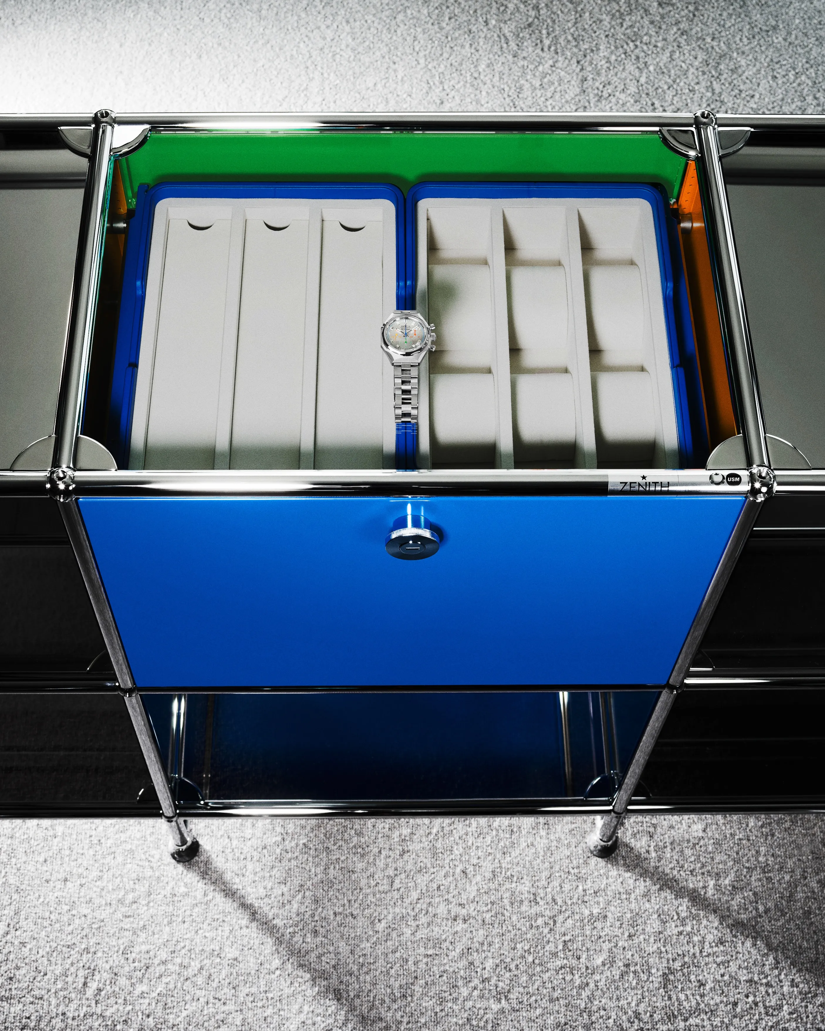 Custom USM Modular Furniture mirrored sideboard with integrated watch storage compartment, complementing the unique Zenith timepiece